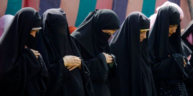 Kashmir Muslim women offer prayers during Eid al-Fitr in Srinagar September 11, 2010.