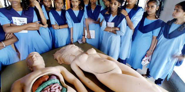 Representative image. Indian school girls look at plastic models of a man and a woman at 'Antarang' (inner view), India's first ever sex museum, in Bombay February 3, 2003 as part of sex education.