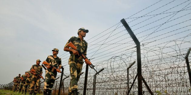 Indian Border Security Force (BSF) soldiers patrolling at the near Petrapole Border outpost at the India-Bangladesh Border on the outskirts of Kolkata,India.India arrested two citizens and said it was expelling a Pakistani high commission staffer for espionage activities on 27 October 2016 after busting a ring that collected documents on defence deployment and border area maps. (Photo by Debajyoti Chakraborty/NurPhoto via Getty Images)