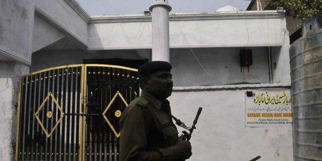 Police patrolling a deserted street of Aman colony at Karond area, on December 12, 2014 in Bhopal.