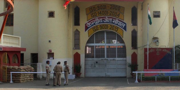Indian police officials gather at the entrance to The Central Jail in Bhopal on November 1, 2016, a day after some inmates escaped and were killed in an encounter with security personnel. STR/AFP/Getty Images