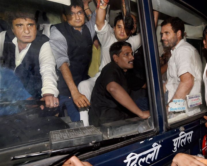 New Delhi: Congress party Vice President Rahul Gandhi with party leaders Raj Babbar,Deepender Singh Hooda and Jyotiraditya Scindia being carried in a police bus from Parliament Street Police Station in New Delhi on Wednesday. Gandhi was earlier detained after he tried to meet family members of a retired army soldier who allegedly committed suicide over One Rank, One Pension scheme. PTI Photo by Manvender Vashist (PTI11_2_2016_000283B)