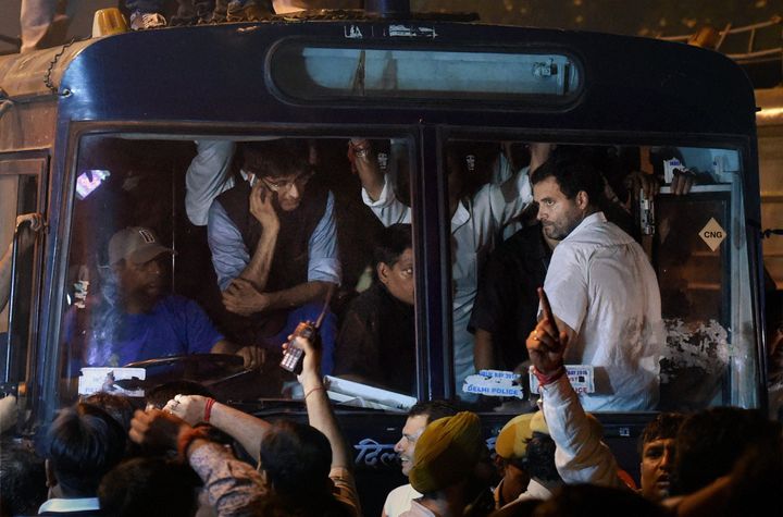 New Delhi: Congress party Vice President Rahul Gandhi being carried in a police bus from Parliament Street Police Station in New Delhi on Wednesday. Gandhi was earlier detained after he tried to meet family members of a retired army soldier who allegedly committed suicide over One Rank, One Pension scheme. PTI Photo by Manvender Vashist (PTI11_2_2016_000276B)