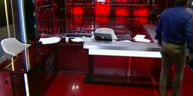 The CNN Turk's anchor chair is empty as the arrival of soldiers on Saturday morning forces them to stop broadcasting.