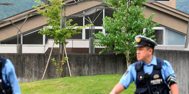 Police officers are seen in front of a facility for the disabled where a knife-wielding man attacked numerous people, in Sagamihara, Kanagawa prefecture, Japan.