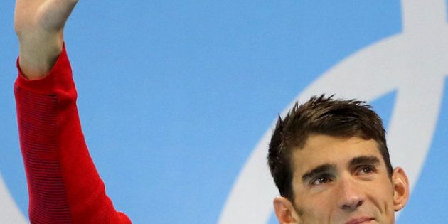 Michael Phelps waves from the podium at the Olympic aquatics stadium on Thursday in Rio de Janeiro, Brazil.