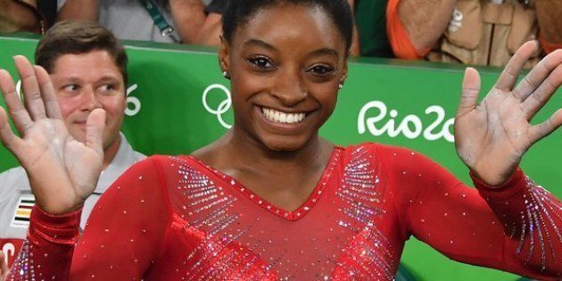 US gymnast Simone Biles celebrates after competing in the women's vault event final of the Artistic Gymnastics at the Olympic Arena during the Rio 2016 Olympic Games in Rio de Janeiro on August 14, 2016. / AFP / Ben STANSALL (Photo credit should read BEN STANSALL/AFP/Getty Images)