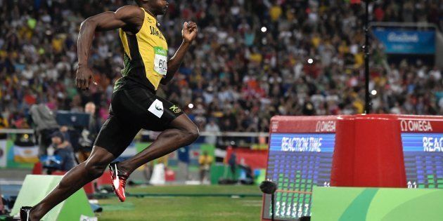 Usain Bolt competes in the men's 200m Final at the Rio 2016 Olympic Games at the Olympic Stadium in Rio de Janeiro on August 18, 2016.