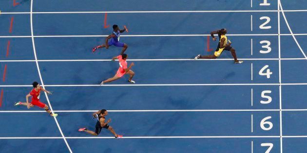 2016 Rio Olympics - Athletics - Final - Men's 4 x 100m Relay Final - Olympic Stadium - Rio de Janeiro, Brazil - 19/08/2016. Usain Bolt (JAM) of Jamaica runs to win the Jamaica team the gold. REUTERS/Lucy Nicholson FOR EDITORIAL USE ONLY. NOT FOR SALE FOR MARKETING OR ADVERTISING CAMPAIGNS.