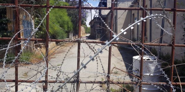 DERYNEIA, CYPRUS - 2016/05/06: Razor wire and metal fencing blocks off a road in the old city area of Nicosia. The divided city is the capital of both the Republic of Cyprus and the Turkish Republic of Northern Cyprus. (Photo by Dominic Dudley/Pacific Press/LightRocket via Getty Images)