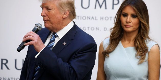 Republican presidential nominee Donald Trump and his wife Melania Trump attend a campaign event in Washington, DC, U.S., October 26, 2016. REUTERS/Carlo Allegri