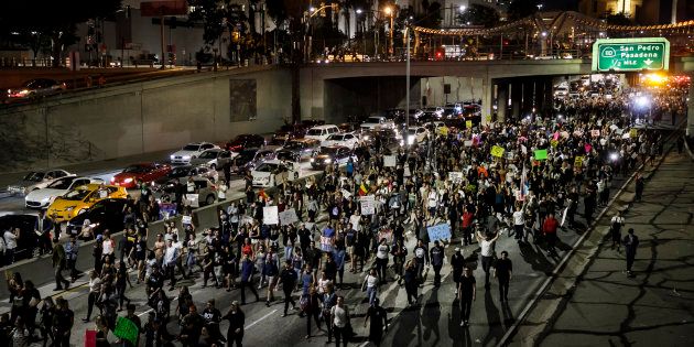 LOS ANGELES, CA - NOVEMBER 10: Anti-Trump protesters flood the 101 freeway as they protest the President-Elect Donald Trump in Los Angeles, Calif., on Nov. 10, 2016. (Photo by Marcus Yam/Los Angeles Times via Getty Images)