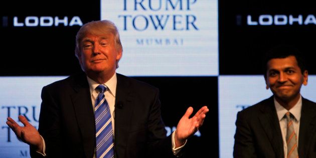 MUMBAI, INDIA - AUGUST 12: Donald J.Trump, Chairman and President of The Trump along with Abhishek Lodha, MD Lodha Group at a news conference to at the launch of Trump Tower on August 12, 2014 in Mumbai, India. The Trump Tower Mumbai has around 300 super luxury units in the three, four and five bedroom configuration, priced in the range of Rs 9 crore to Rs 18 crore. (Photo by Kunal Patil/Hindustan Times via Getty Images)