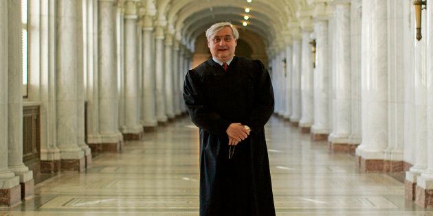 Judge Alex Kozinski isn't assigned to the three-judge panel considering a federal court's halt of the travel ban.