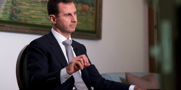 Syria's President Bashar al-Assad speaks during an interview with a Cuban news agency in this handout picture provided by SANA on July 21, 2016. SANA/Handout via REUTERS ATTENTION EDITORS - THIS PICTURE WAS PROVIDED BY A THIRD PARTY. REUTERS IS UNABLE TO INDEPENDENTLY VERIFY THE AUTHENTICITY, CONTENT, LOCATION OR DATE OF THIS IMAGE. FOR EDITORIAL USE ONLY.