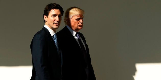 U.S. President Donald Trump, left, greets Justin Trudeau, Canada's prime minister, as he arrives to the West Wing of the White House in Washington, D.C., U.S., on Monday, Feb. 13, 2017. Trudeau, hailed by Joe Biden as one of the last champions of liberalism, heads to Washington for his first meeting with Trump, whose bellicose statements and immigration restrictions reveal a deep gulf between the two leaders. Photographer: Andrew Harrer/Bloomberg via Getty Images