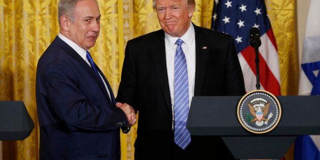 President Donald Trump greets Israeli Prime Minister Benjamin Netanyahu after a joint news conference at the White House on Feb. 15, 2017.