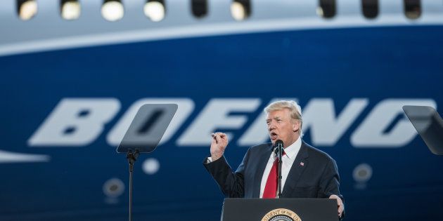 NORTH CHARLESTON, SC - FEBRUARY 17: U.S. President Donald Trump addresses a crowd during the debut event for the Dreamliner 787-10 at Boeing's South Carolina facilities on February 17, 2017 in North Charleston, South Carolina. The airplane begins flight testing later this year and will be delivered to airline customers starting in 2018. (Photo by Sean Rayford/Getty Images)