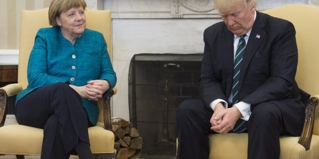 US President Donald Trump and German Chancellor Angela Merkel meet in the Oval Office of the White House in Washington, DC, on March 17, 2017. / AFP PHOTO / SAUL LOEB (Photo credit should read SAUL LOEB/AFP/Getty Images)