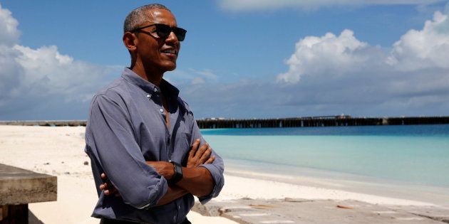 Yes, this is a real photo, but it's not on Tetiaroa. Barack Obama smiles as he looks out at Turtle Beach on a visit to Papahanaumokuakea Marine National Monument, Midway Atoll, U.S., September 1, 2016.