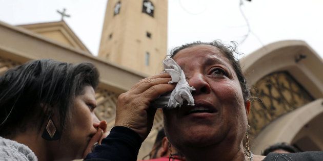 A relative of one of the victims reacts after a church explosion killed at least 21 in Tanta, Egypt, April 9, 2017. REUTERS/Mohamed Abd El Ghany