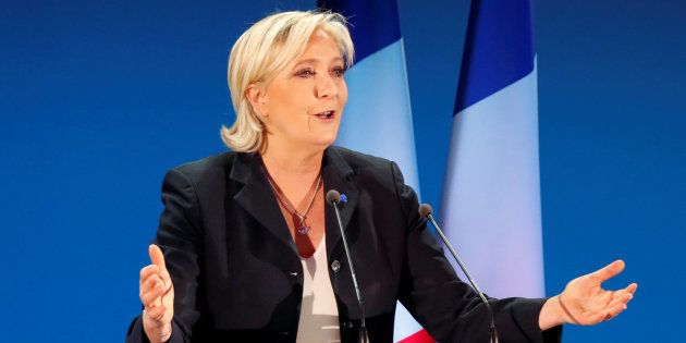 Marine Le Pen, French National Front political party leader and candidate for French 2017 presidential election, delivers a speech after early results in the first round of the election Sunday in Henin-Beaumont, France.
