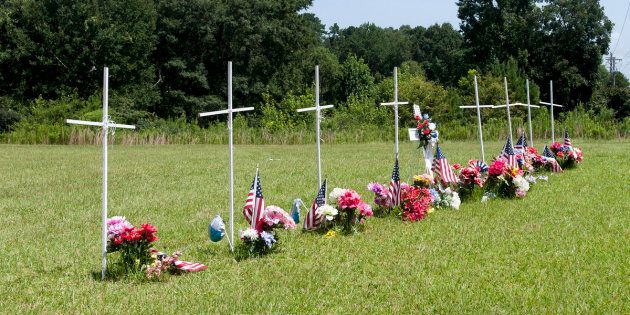 Eight white crosses were erected in memory of the victims in Mississippi.