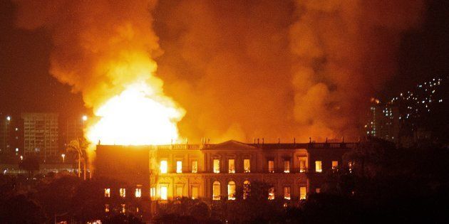 A massive fire engulfs the National Museum in Rio de Janeiro, one of Brazil's oldest, on September 2, 2018. - The cause of the fire was not yet known, according to local media. (Photo by STR / AFP) (Photo credit should read STR/AFP/Getty Images)