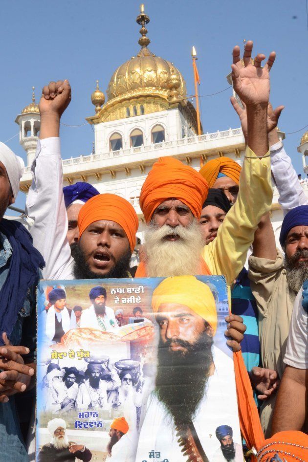 Indian Sikh activists from radical Sikh organisations shout slogans in support of Sikh leader Sant Jarnail Singh Bhindranwale and Khalistan, the name for an envisioned independent Sikh state, after prayers at Sri Akal Takht at the Golden Temple in Amritsar on June 6, 2015.