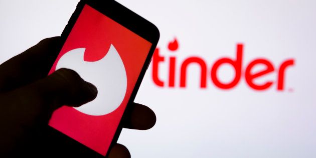 Berlin, Germany - February 26: In this photo illustration the logo of dating app Tinder is displayed on a smartphone on February 26, 2018 in Berlin, Germany. (Photo Illustration by Thomas Trutschel/Photothek via Getty Images)