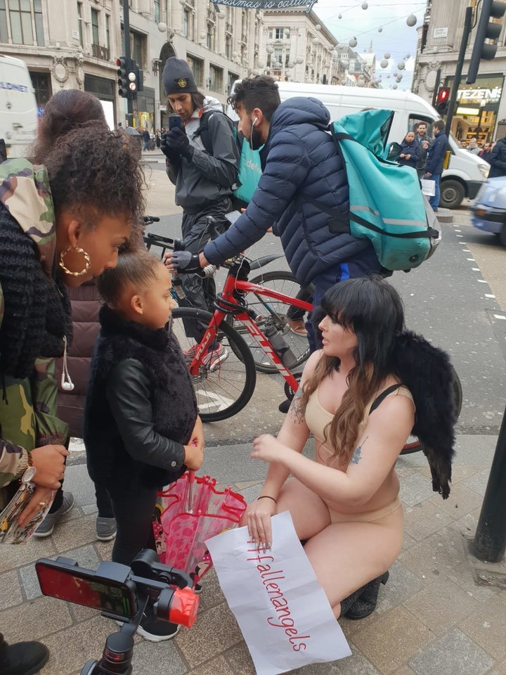 Passersby approached the protesters with questions and grateful tears.