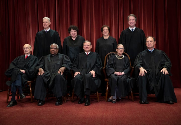 The justices of the U.S. Supreme Court gather for a formal group portrait on Nov. 30. Seated from left: Stephen Breyer, Clare