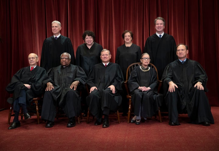 The justices of the U.S. Supreme Court gather for a formal group portrait on Nov. 30. Seated from left: Stephen Breyer, Clarence Thomas, John Roberts, Ruth Bader Ginsburg and Samuel Alito Jr. Standing behind from left: Neil Gorsuch, Sonia Sotomayor, Elena Kagan and Brett Kavanaugh.