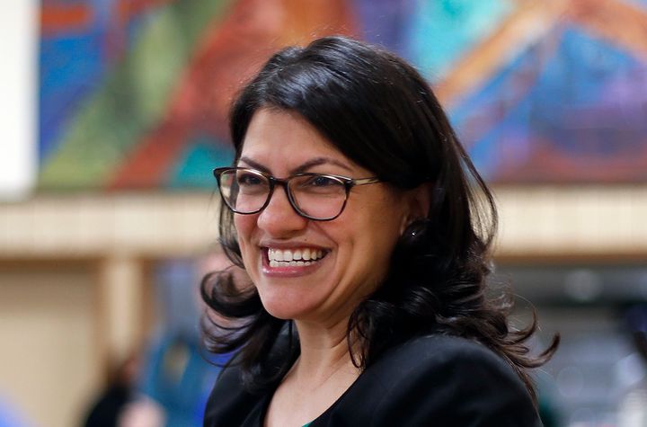 Rashida Tlaib smiles during a rally in Dearborn, Michigan, in October. The representative-elect said she plans to wear a Palestinian thobe when she's sworn into Congress in January.