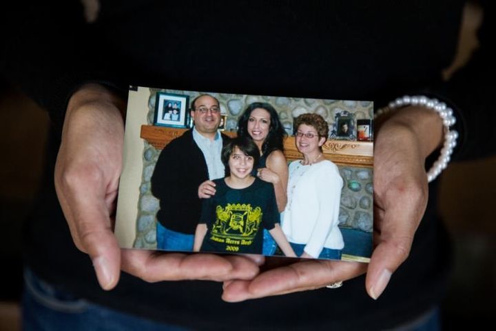 A copy of an old family photo showing Andrew Matt, Michael Matt, Gina Aparicio and Judy Matt.