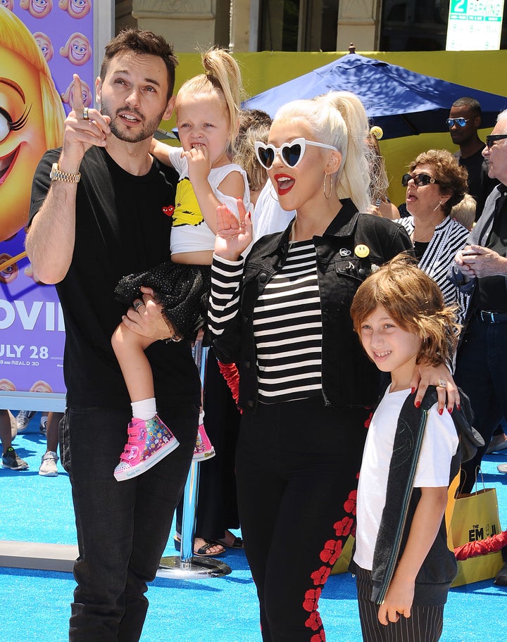 Aguilera with her family at the premiere of "The Emoji Movie" in Los Angeles, July 23, 2017.