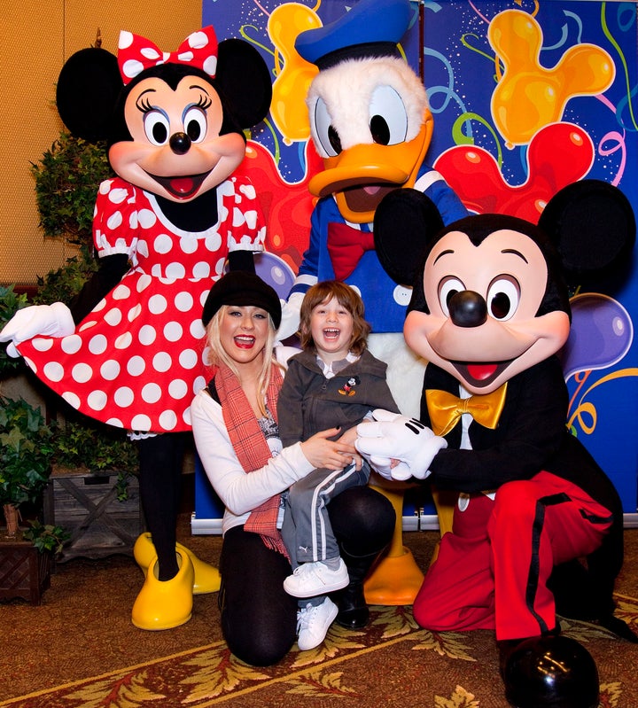 Aguilera with Max in 2010 at Disneyland in Anaheim, California.