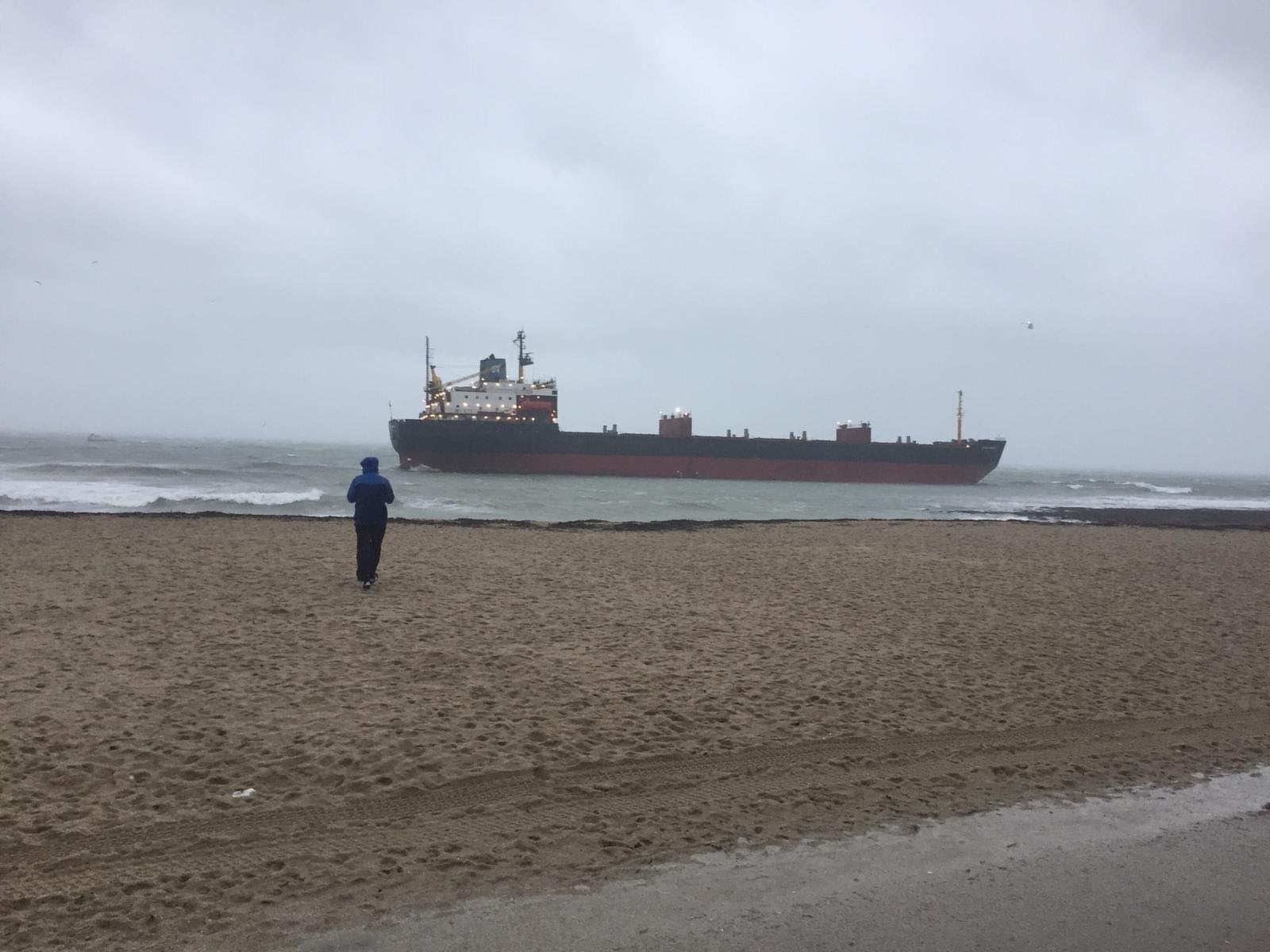 Massive cargo ship runs aground off Cornish beach