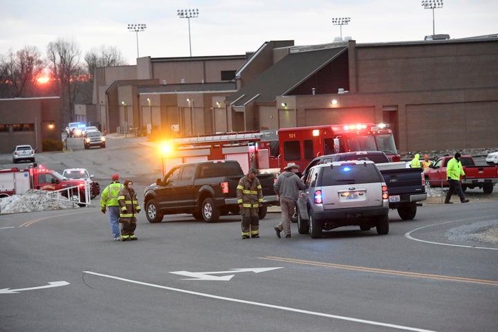 Emergency responders outside Marshall County High School in Kentucky following a school shooting that killed two and wounded