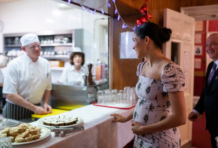 The duchess speaks to head chef Stuart Jones during her visit to Brinsworth House.