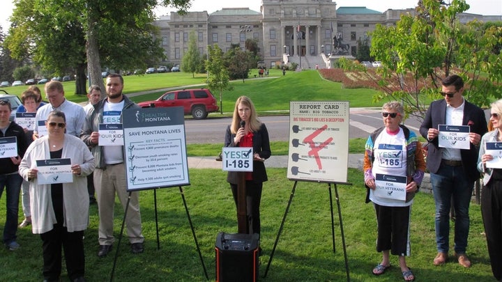Activists gather in front of the Montana Capitol in support of a measure to continue Medicaid expansion in the state. Voters