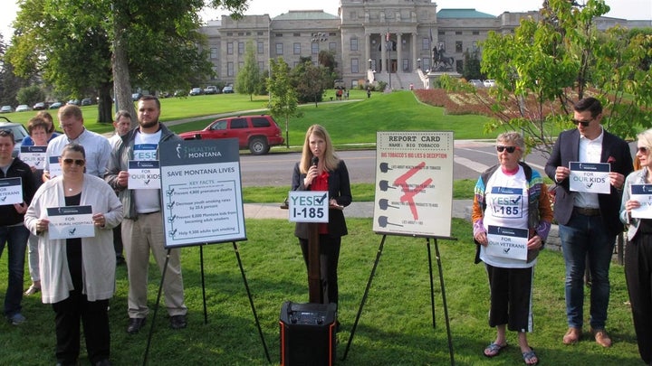 Activists gather in front of the Montana Capitol in support of a measure to continue Medicaid expansion in the state. Voters rejected the citizen initiative last month, 53 to 47 percent. Three other red states passed similar measures the same day. 