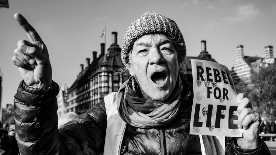 Extinction Rebellion activists gather on Nov. 17 in London, blocking the traffic in protest to demand action on climate change from the British government.