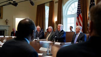FILE - In this Oct. 16, 2017, file photo President Donald Trump speaks during a cabinet meeting at the White House in Washington, with from left, Director of National Intelligence Dan Coats, Interior Secretary Ryan Zinke, Secretary of State Rex Tillerson, and Defense Secretary Jim Mattis. The White House has already begun work on one of Trump’s next priorities: welfare reform. He said changes were “desperately needed in our country” and that his administration would soon offer plans. In October, Trump said at a Cabinet meeting that welfare reform was “becoming a very, very big subject, and people are taking advantage of the system.” (AP Photo/Evan Vucci)