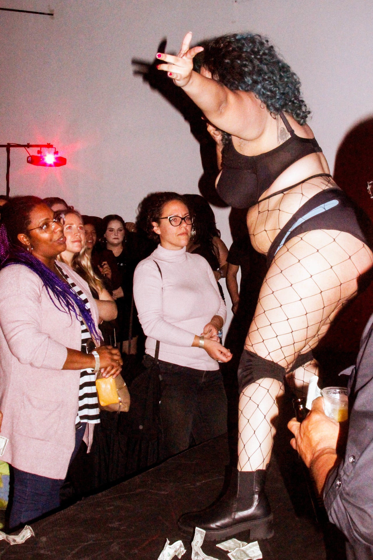 Vanessa Gritton dances for her audience during Thicc Strip.