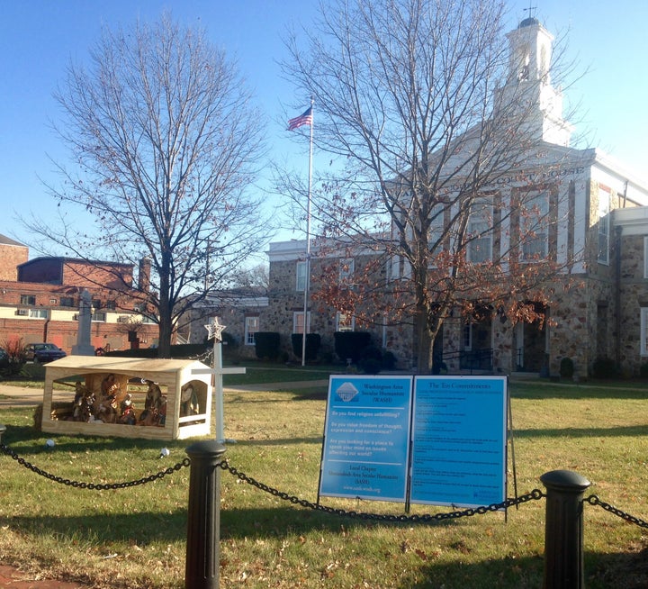 A 2017 photo shows the Shenandoah Area Secular Humanists' "Ten Commitments" sign on the lawn of the courthouse in Front Royal, Virginia. The same sign was placed at the courthouse this year.