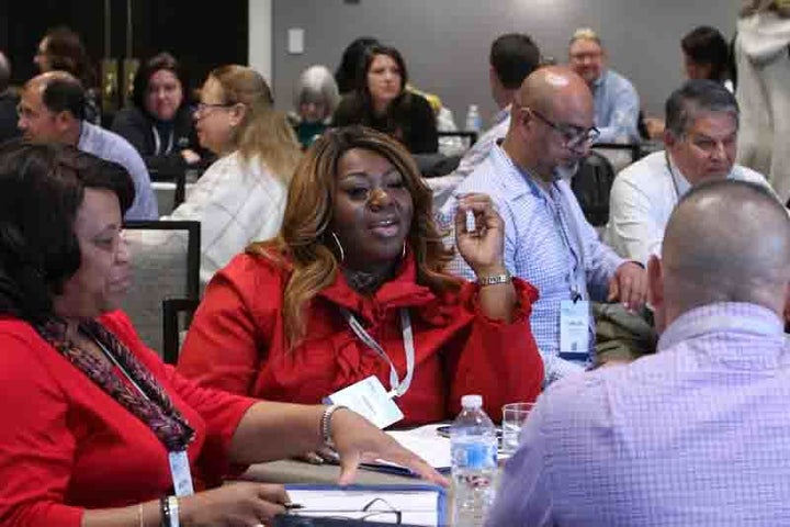 <p>Bertha Rice (left) and Doris Jean Franklin with the Christian Housing Development Organization of Columbus, Mississippi, participate in a discussion at the Housing Assistance Council conference. </p>