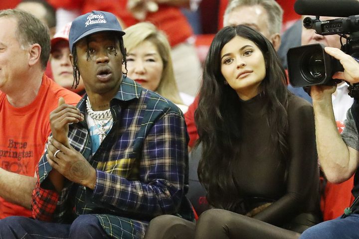 Travis Scott and Kylie Jenner sit courtside at the 2018 NBA Playoffs in May. 