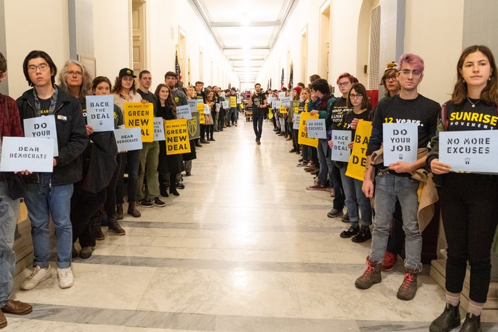 Sunrise Movement protesters inside the office of Nancy Pelosi (D-CA) to advocate that Democrats support the Green New Deal, at the U.S. Capitol in Washington, DC on Dec. 10, 2018.