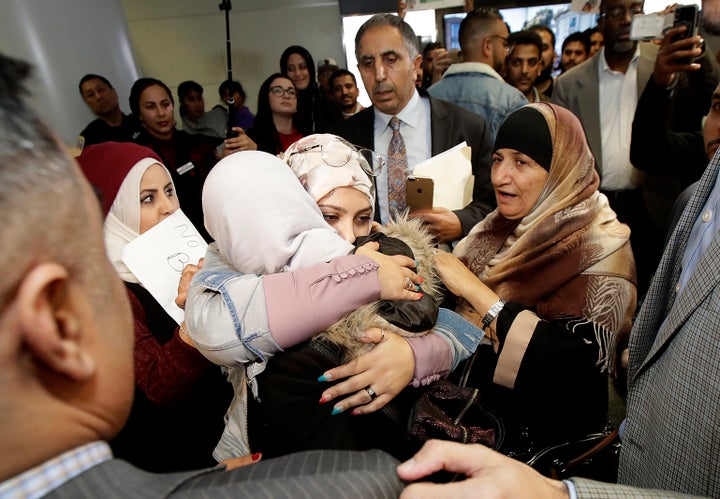 Shaima Swileh arrives in the U.S. to see her husband and son. “This is the happiest day of my life,” Hassan <a hr